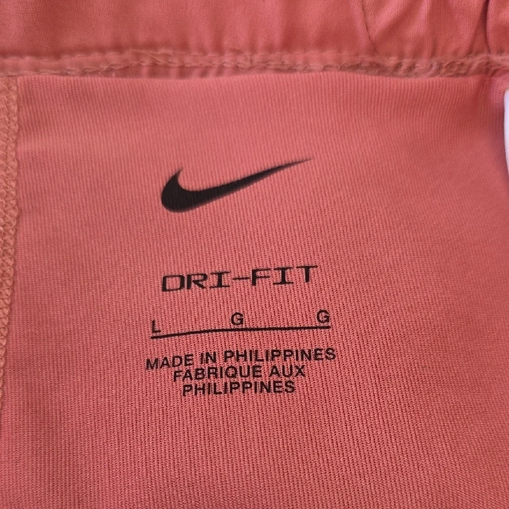 Nike Women's Peach Athletic Shorts.  Size Large